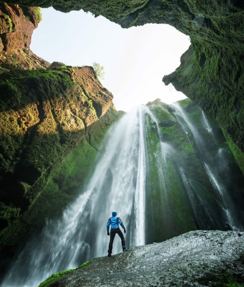 man-in-the-cave-near-the-gljufrabui-waterfall-2025-02-21-12-32-54-utc